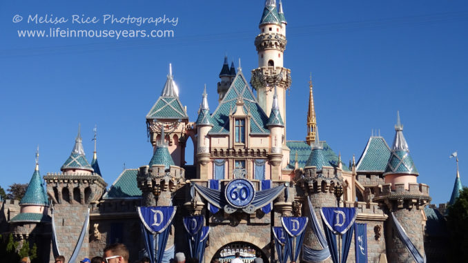 Sleeping Beauty Castle in Disneyland. 60th Anniversary banners.
