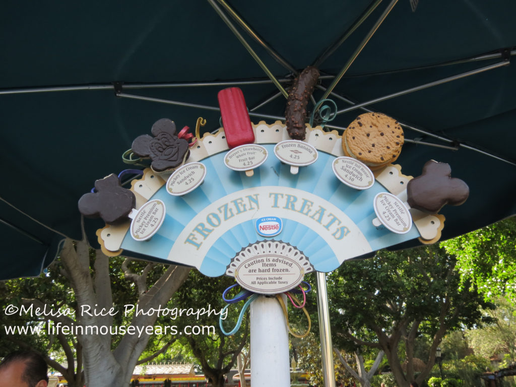 Disneyland food bucket list. Ice cream display on a ice cream cart in Disneyland.