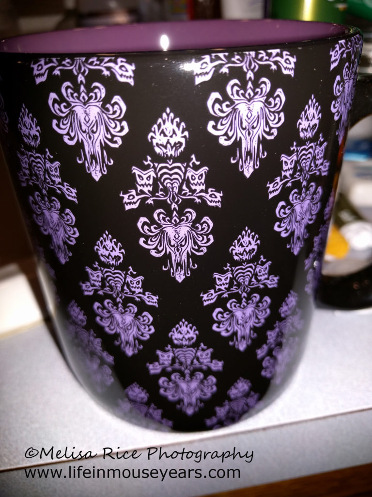 Souvenirs. Haunted Mansion coffee cup from Disneyland.