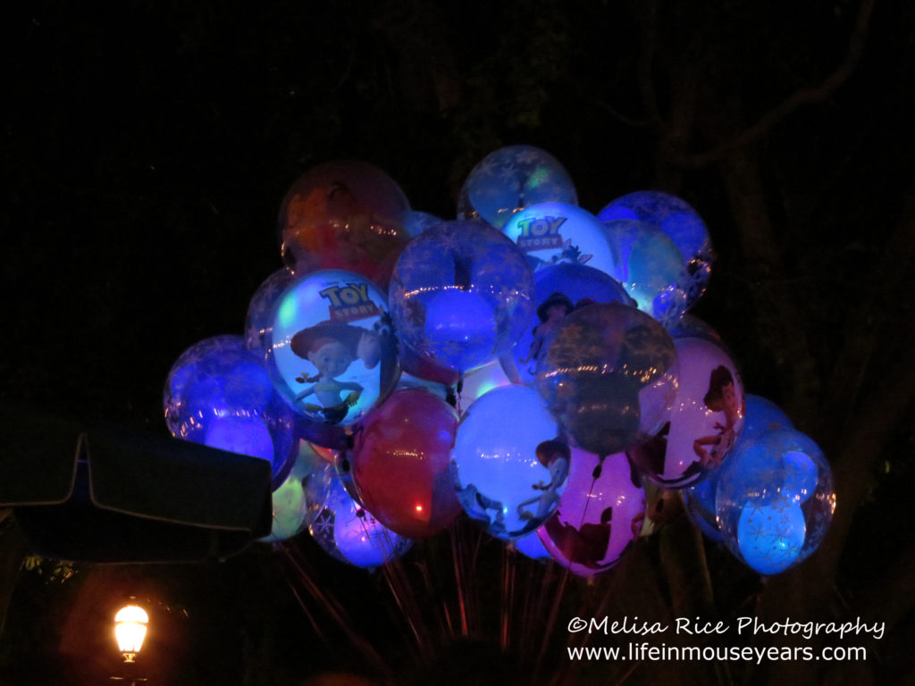 Souvenirs. Glow balloons at night in Disneyland.